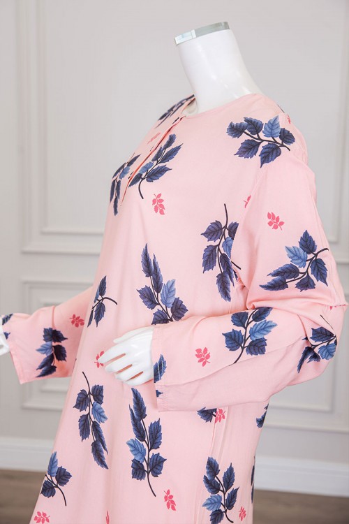 قميص نسائي طويل لون خربزي مشجر ياقة دائرية بأزرار من الأمام و أكمام طويلة