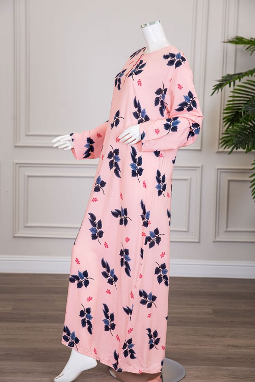 قميص نسائي طويل لون خربزي مشجر ياقة دائرية بأزرار من الأمام و أكمام طويلة