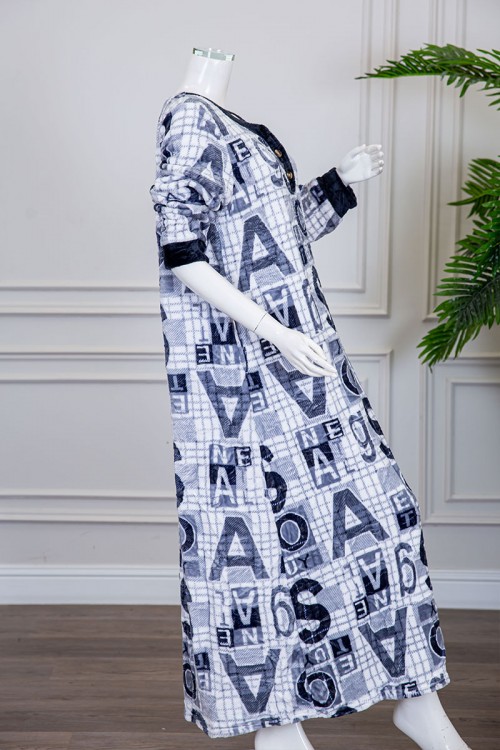 قميص نسائي شتوي طويل متعددة الالوان  مزين بأحرف و خطوط على شكل مربعات متعددة الالوان ياقة دائرية بأزرار و أكمام طويلة