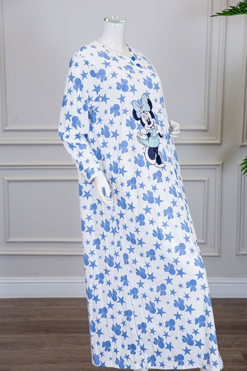 قميص نسائي شتوي طويل لون أبيض مزين برسومات باللون السماوي ياقة دائرية بأزرار و أكمام طويلة