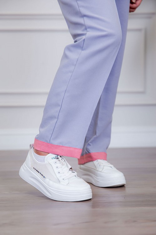 بيجامة عاملة قطعتين متعددة الألوان بلوزة بياقة مطوية بأزرار و جيوب من الأمام بأكمام قصيرة مع بنطلون طويل