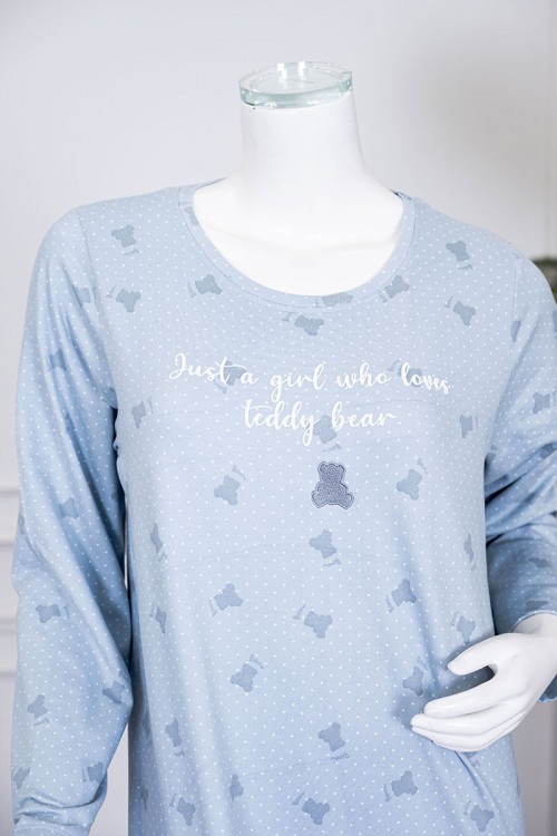 قميص نسائي طويل لون سماوي مزين بكتابات ورسومات ياقة دائرية و بأكمام طويلة