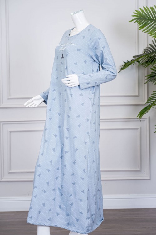 قميص نسائي طويل لون سماوي مزين بكتابات ورسومات ياقة دائرية و بأكمام طويلة