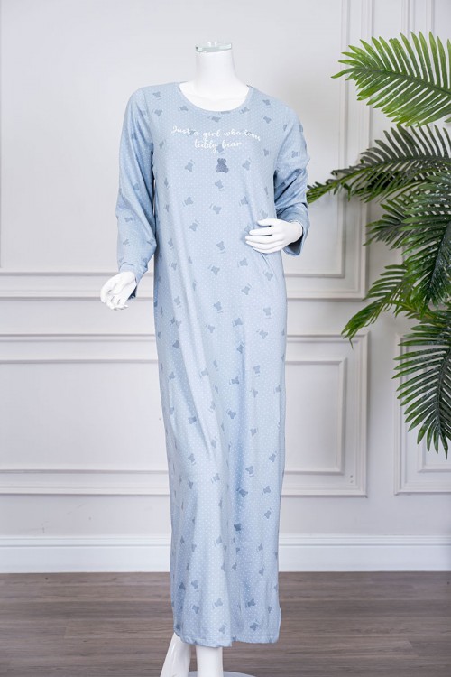 قميص نسائي طويل لون سماوي مزين بكتابات ورسومات ياقة دائرية و بأكمام طويلة