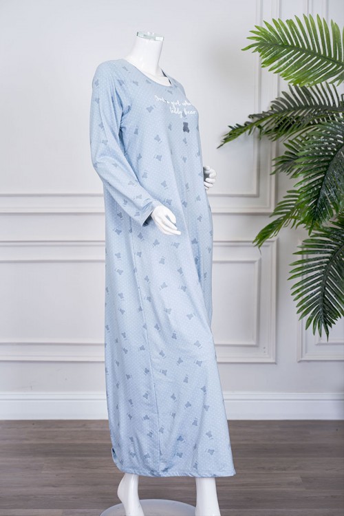 قميص نسائي طويل لون سماوي مزين بكتابات ورسومات ياقة دائرية و بأكمام طويلة