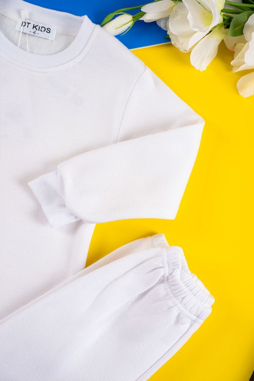 بيجاما أطفال شتوي قطعتين لون أبيض بلوزة بياقة دائرية و أكمام طويلة مع بنطلون طويل