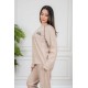 بيجاما نسائية قطعتين لون بيج مزينة بكتابات وخطوط باللون الأسود من الأمام ياقة دائرية و بأكمام طويلة مع بنطلون طويل