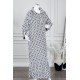 قميص نسائي طويل شتوي لون أبيض و أسود ياقة مطوية و أزرار من الأمام و بأكمام طويلة