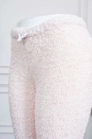 بنطلون نسائي صوف لون بيج برباط في الخصر و زم في الأسفل 