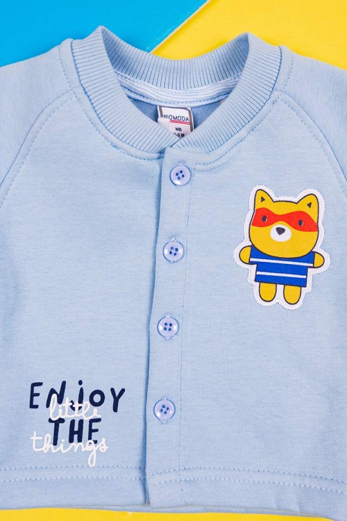 طقم-قطعتين-ولادي-بلوزة-لون-سماوي-مزينة-برسومات-