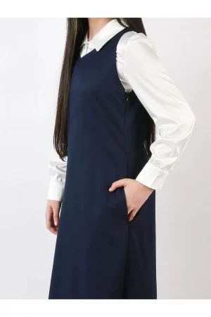 مريول ثانوي سادة بقصه مثلث بجيوب اماميه