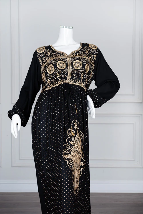 Long black women's *jalabiya* (oversized fit), featuring gold embroidery and patterns
