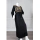 Long black women's *jalabiya* (oversized fit), featuring gold embroidery and patterns