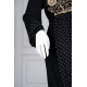 Long black women's *jalabiya* (oversized fit), featuring gold embroidery and patterns