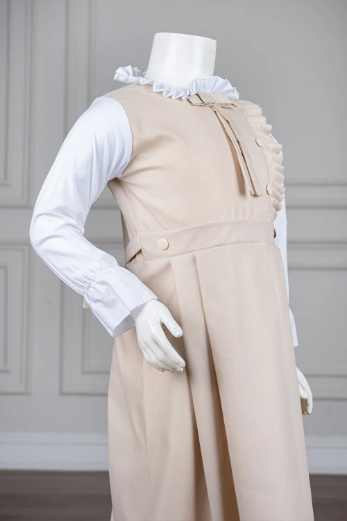 مريول مدرسي بناتي لون بيج فاتح بقميص أبيض متصل مزين بربطة من الياقة و أزرار و كشكشة من الأمام بسحاب مخفي و رباط في الخلف