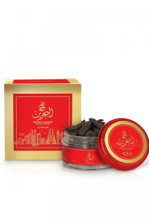 بخور البحرين (Bakhoor Al Bahrain) قطع عود معطرة في علبة زجاجية دائرية بغطاء أحمر