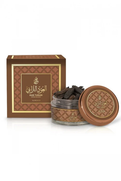 العود الترابي (Oud Turabi) قطع عود معطرة في علبة زجاجية دائرية بغطاء بني
