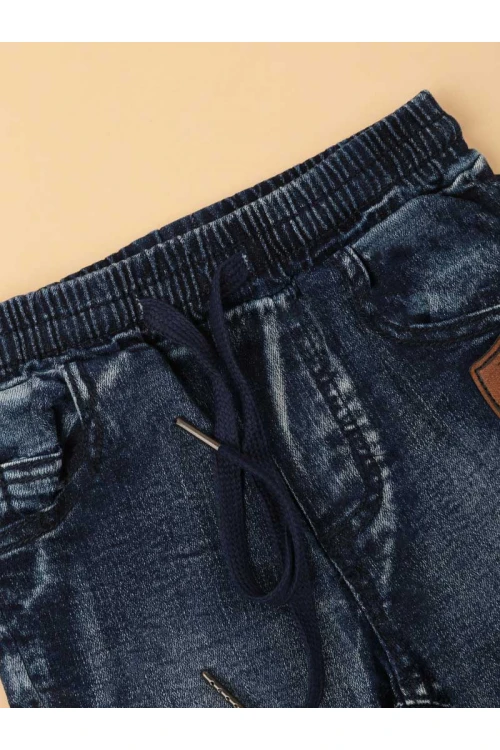 طقم بنطلون جينز مع بلوفر مضلع بأكمام طويلة