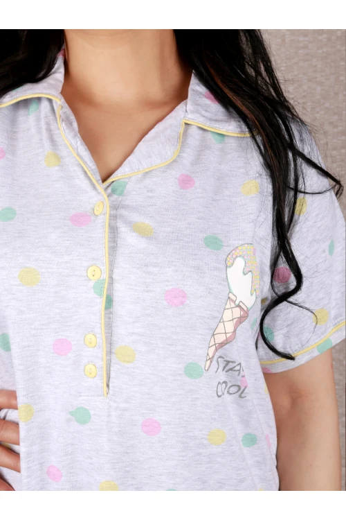 قميص طويل منقط بأزرار إغلاق