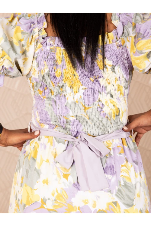 فستان طويل بتفاصيل مطاط مزين بطبعات زهور