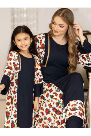 جلابية رمضانية بناتي تتميز بأكمام طويلة وجوانب مشجرة وحزام على الظهر