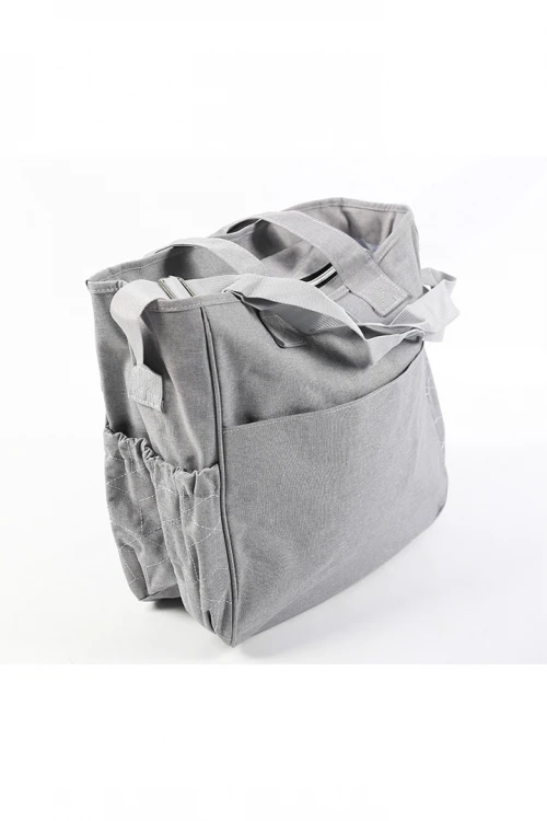 حقيبة مواليد جيوب أمامية وسحاب مغلق