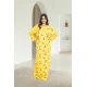قميص روز نسائي طويل لون أصفر بطبعات ورود كامل أكمام طويلة مزمومة وفتحة صدر دائرية بزم خفيف بشكل مثلث من الأمام