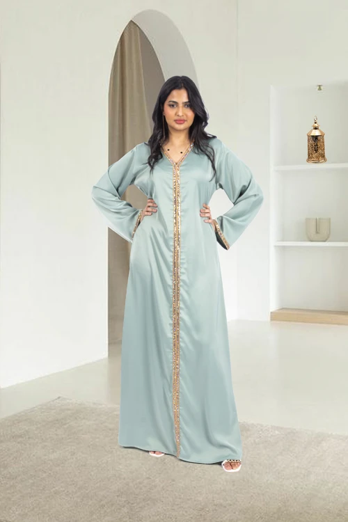 جلابية نسائي أنيقة قماش ناعم لون تفاحي فتحة الصدر شكل سبعة بتطيز كامل طولي من الصدر والأكمام