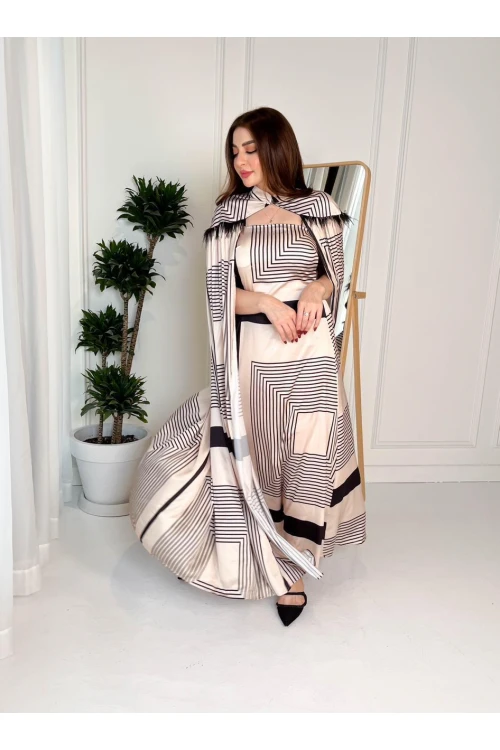 فستان نسائي أنيق قطعتين منفصلة قماش ناعم مخطط الفستان داخلي بدون أكمام و الخارجي بياقة مرتفعة و ريش أسود على الأكتاف