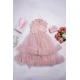 فستان بناتي أنيق لون وردي سادة قماش تل بدون اكمام ياقة مرتفعة بكرانيش وريش من الأمام و ارباط على الخصر