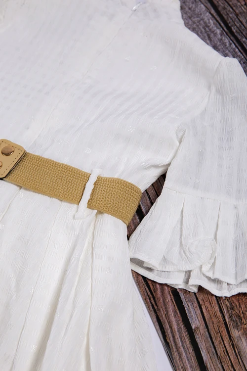 فستان بناتي أنيق لون أبيض ياقة مرتفعة وأزرار أمامية وحزام باللون البيح بفيونكة وكريستال باللون الذهبي