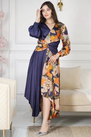 فستان نسائي أنيق قماش مشجر مدموج مع قماش سادة كحلي بحركة مميزة على الخصر وكسرات من الأسفل و أكمام طويلة بأزرار قفل 