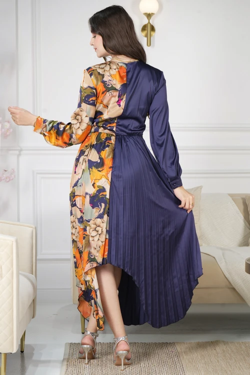 فستان نسائي أنيق قماش مشجر مدموج مع قماش سادة كحلي بحركة مميزة على الخصر وكسرات من الأسفل و أكمام طويلة بأزرار قفل