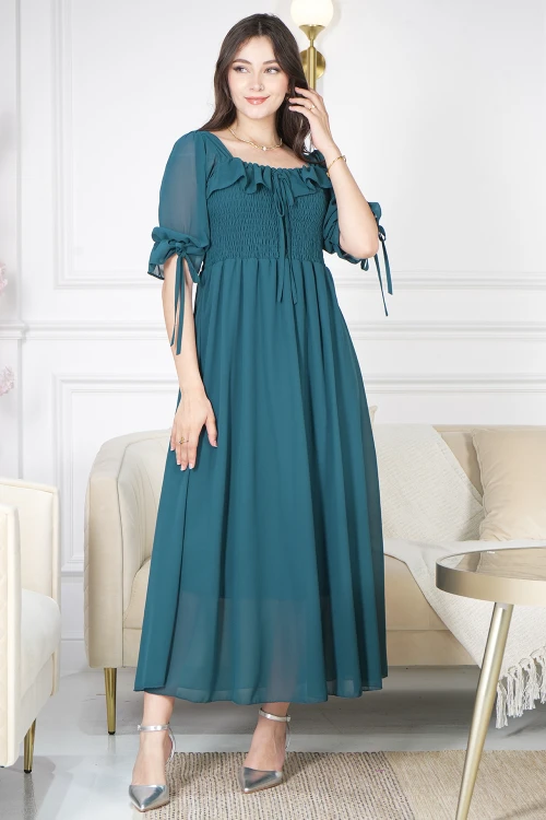 فستان نسائي أنيق لون أخضر بقصة صدر دائرية مزمومة عليها رباط من الامام و الأكمام