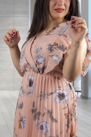 فستان نسائي أنيق قماش مشجر بدون أكمام بفتحة صدر مثلثة عليها زرار قفل وكرانيش على الأكتاف و زم وحزام على الخصر 