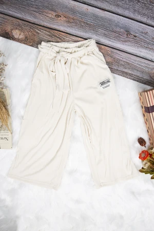 بنطلون بناتي واسع أنيق لون بيج بجيوب من الأمام و رباط على الخصر