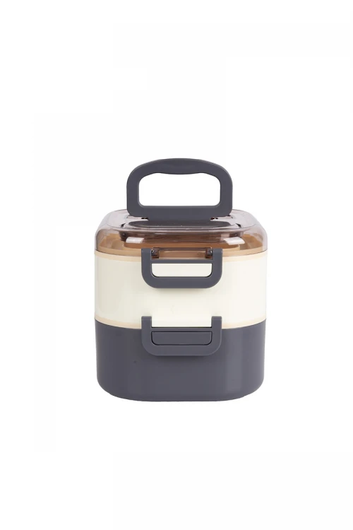 حافظة طعام مدرسية معدنية دورين مقسمة مع ملعقة وعليها غطاء شفاف