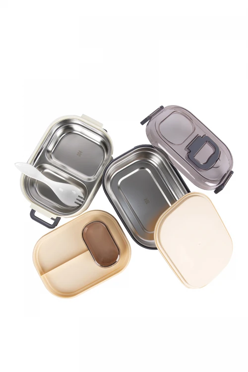 حافظة طعام مدرسية معدنية دورين مقسمة مع ملعقة وعليها غطاء شفاف
