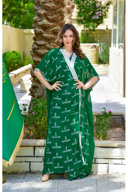بشت وطني نسائي أنيق لون أخضر قماش شيفون بأطراف مطرزة باللون الفضي أكمام قصيرة و مفتوح برباط من الأمام