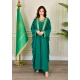 جلابية نسائي أنيقة قطعتين لون أخضر بأطراف مطرزة باللون الذهبي على الصدر و الأكمام الطويلة و برباط من الأمام