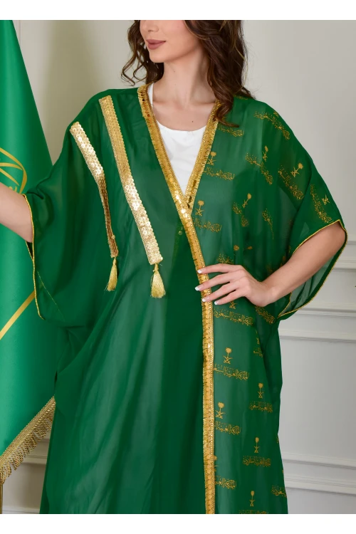 بشت وطني نسائي أنيق لون أخضر قماش شيفون بأطراف مطرزة باللون الذهبي أكمام قصيرة و مفتوح برباط من الأمام