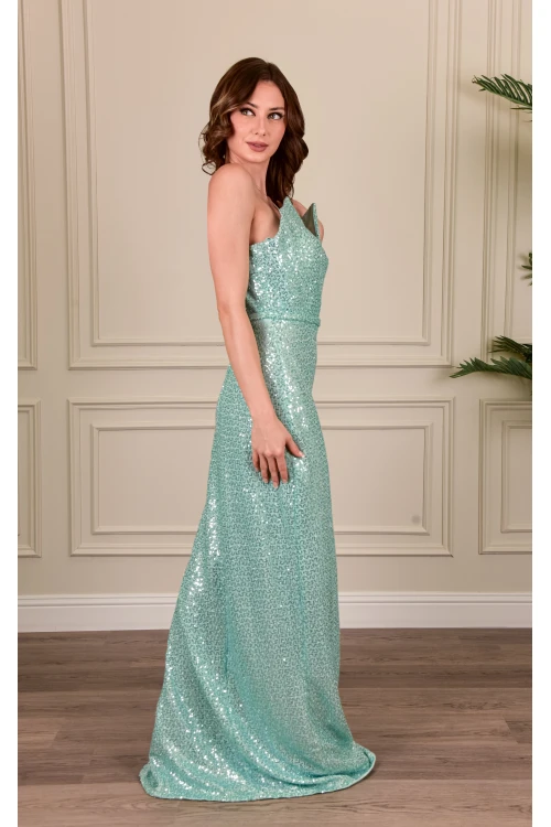 فستان نسائي سهرة أنيق طويل قماش ترتر لون تركواز  بدون أكمام بفتحة مثلثة من الصدر بقماش تل من الداخل وفتحة كبيرة من الأسفل