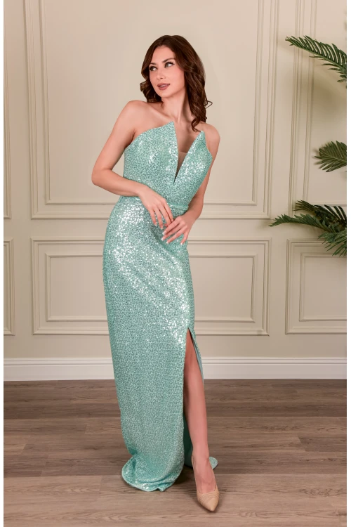 فستان نسائي سهرة أنيق طويل قماش ترتر لون تركواز  بدون أكمام بفتحة مثلثة من الصدر بقماش تل من الداخل وفتحة كبيرة من الأسفل