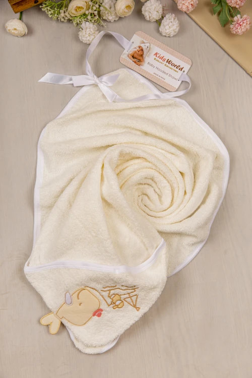 منشفة استحمام مواليد لون بيج بغطاء رأس مزينة برسومات كرتونية