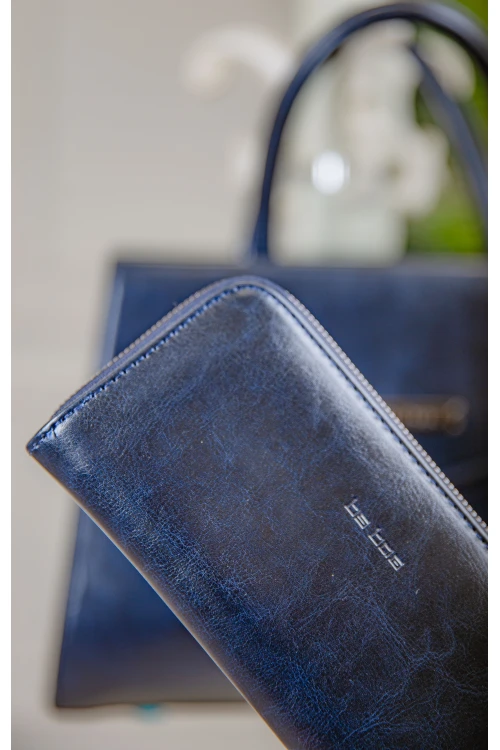 حقيبة يد نسائية مصنوعة من الجلد بتصميم أنيق مع محفظة صغيرة وجيب خلفي