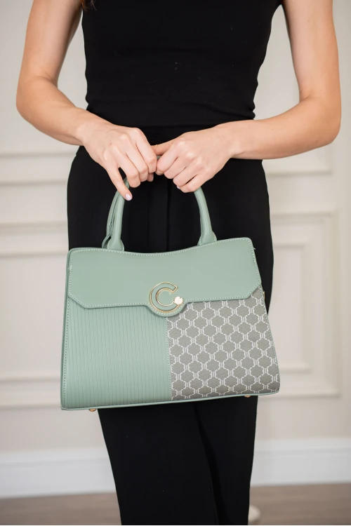 حقيبة يد نسائية لون أخضر بطابع مميز مع حمالة للكتف