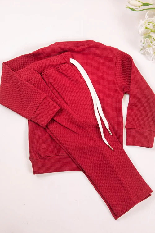 طقم بناتي أنيق قطعتين لون كحلي أكمام طويلة مع كتابة أمامية و بنطلون بجيوب و مطاط من الأكمام