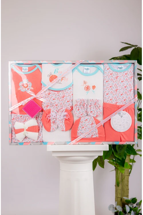 طقم هدايا مواليد 14 قطعة لون برتقالي وأبيض مزينة برسومات كرتونية