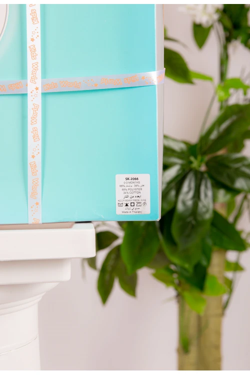 طقم هدايا مواليد 14 قطعة لون برتقالي وأبيض مزينة برسومات كرتونية