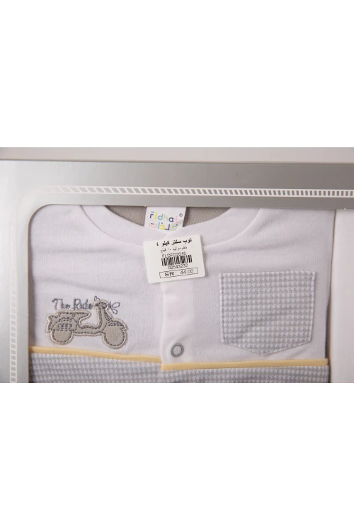 طقم هدايا مواليد 10 قطع لون بني وأبيض مزينة برسومات كرتونية